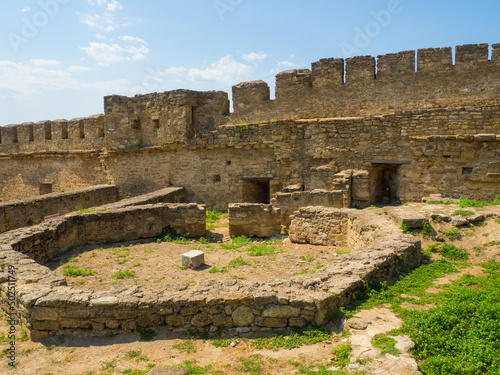 Akkerman fortress. Medieval castle near the sea. Stronghold in Ukraine. Ruins of the citadel of the Bilhorod-Dnistrovskyi fortress, Ukraine. Battlement defensive wall from the estuary photo