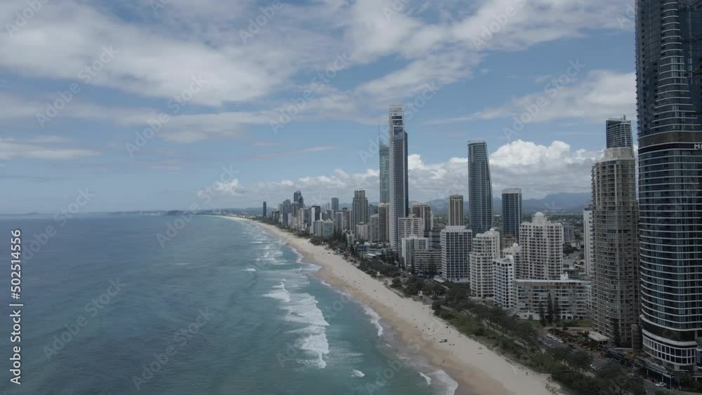 Modern Urban Area On The Shoreline. Surfers Paradise In The City Of Gold Coast In Queensland, Australia. aerial pullback Modern Urban Area On The Shoreline. Surfers Paradise In The City Of Gold Coast In Queensland, Australia. aerial pullback