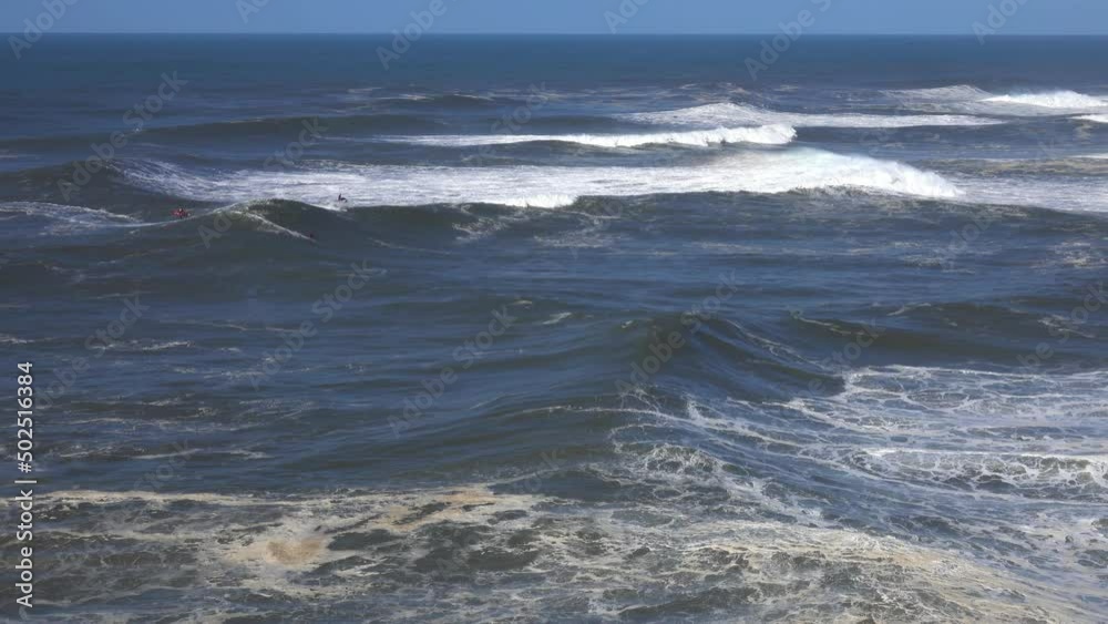 Large foamy waves rolling on the surface of a stormy ocean, 4k Large foamy waves rolling on the surface of a stormy ocean, 4k