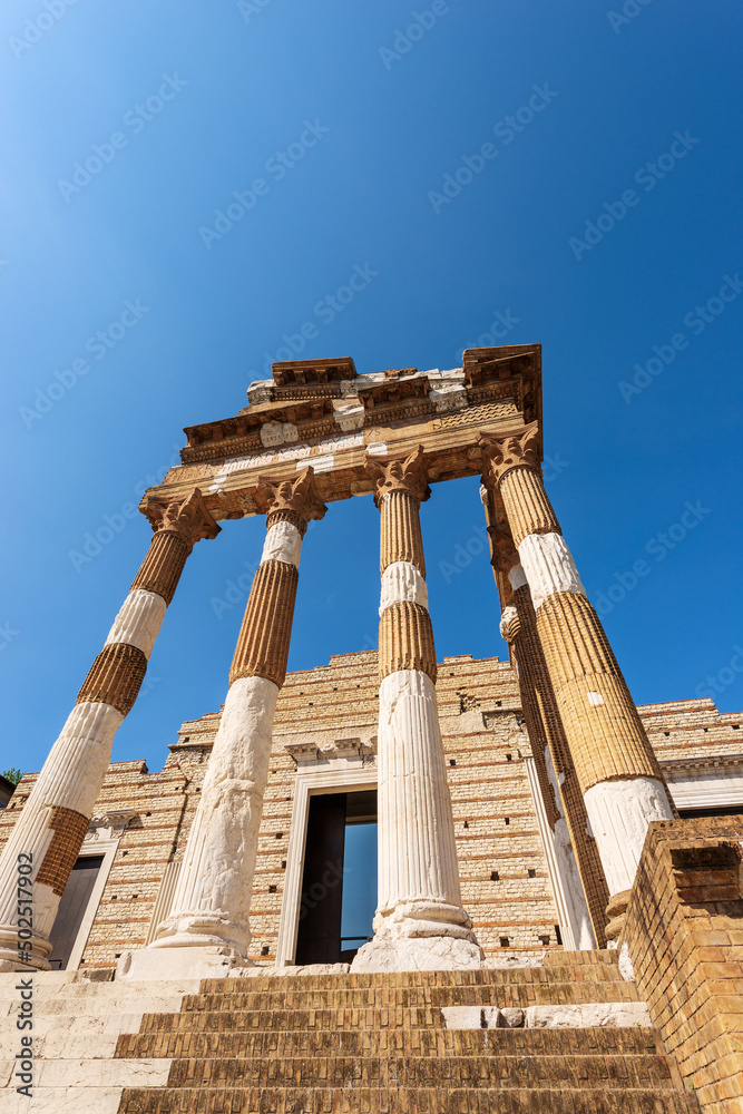 Ancient ruins of the Capitolium Roman Temple (Tempio Capitolino) in Brescia downtown, 73 AC, UNESCO world heritage site, Lombardy, Italy, Europe.