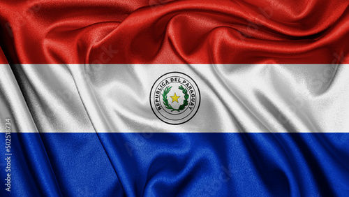 Close up realistic texture fabric textile silk satin flag of Paraguay waving fluttering background. National symbol of the country. 14th of May, Happy Day concept photo