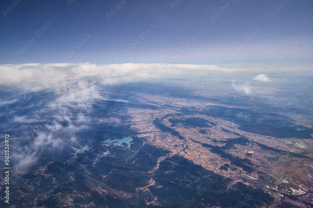 Aerial view of spain through the window of an airliner