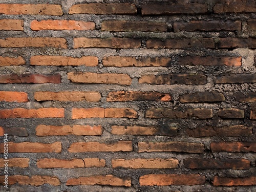 Red brick wall background for design photo