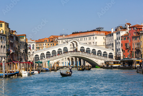 Venice Rialto bridge over Canal Grande with gondola travel traveling holidays vacation town in Italy © Markus Mainka
