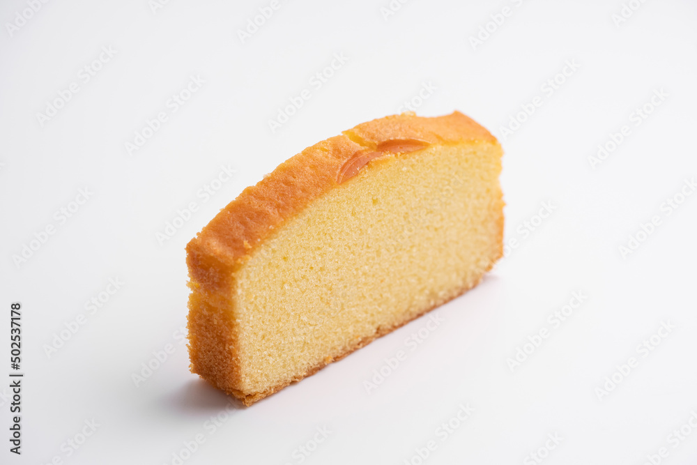 Homemade butter cake slice on isolated white background