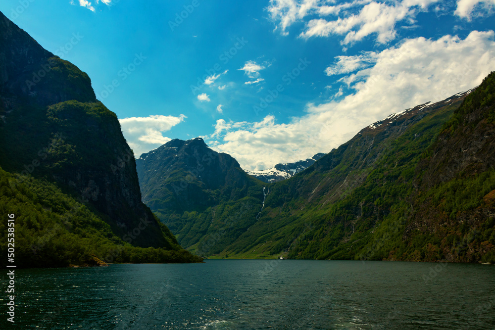 Fototapeta premium Amazing beautiful view of the Nærøyfjord in Norway Scandinavia with snow mountains and colorful fjord