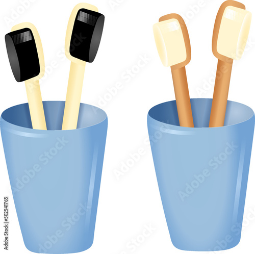 Toothbrushes in a glass. Blue glass.