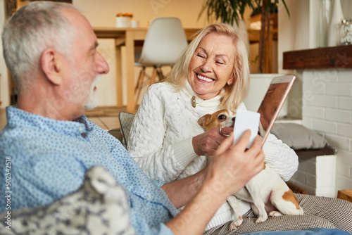 Retired couple as best agers shopping online photo