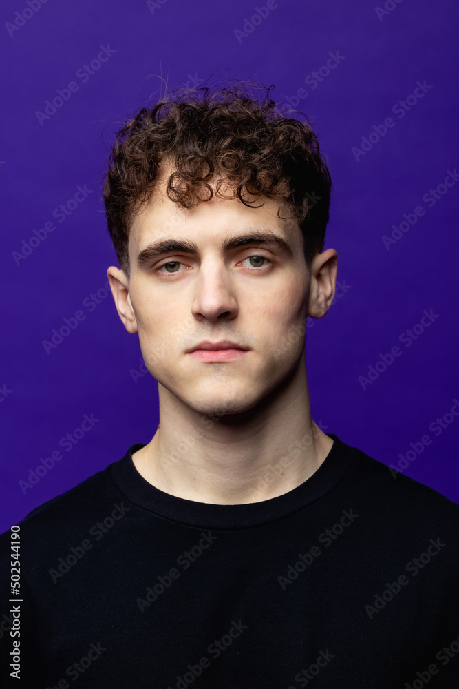 handsome men portrait studio. Coloured background. Young handsome men portrait studio. Coloured background. Young