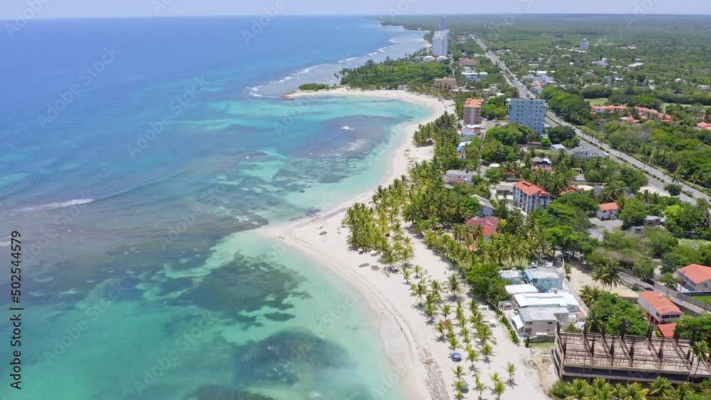 Aerial View Of Tropical Beach And Holiday Hotels At Juan Dolio In San Pedro de Macoris, Dominican Republic. Aerial View Of Tropical Beach And Holiday Hotels At Juan Dolio In San Pedro de Macoris, Dominican Republic.