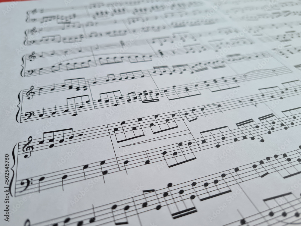 Musical notes closeup. Musical work classic and symphony concept Musical notes closeup. Musical work classic and symphony concept