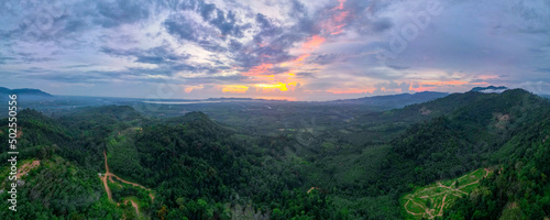 Aerial and panorama view over top of Khao Kai Nui in Phangnga province of Thailand show evening light and golden hour near Andaman bay with beautiful landscapt of sounthern part of Thailand.