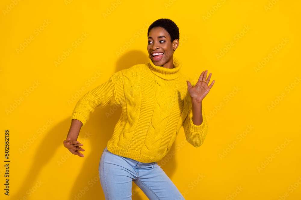 Photo of carefree cheerful lady have fun in disco club look blank space dreaming isolated on yellow vivid color background Photo of carefree cheerful lady have fun in disco club look blank space dreaming isolated on yellow vivid color background