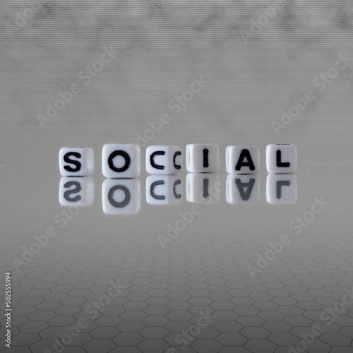 social word or concept represented by black and white letter cubes on a grey horizon background stretching to infinity