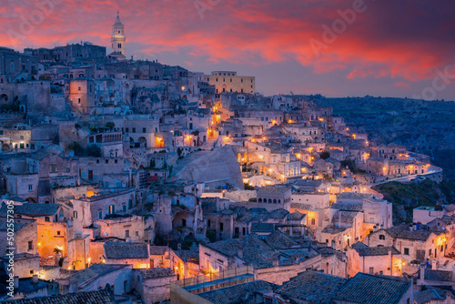 The old town of Matera  Basilicata  Southern Italy during a beautiful sunset. Sassi di Matera blue hour and city lights