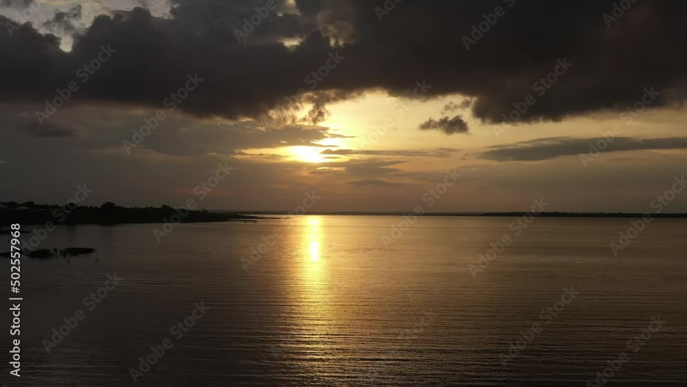Sunset on a river body Sunset on a river body