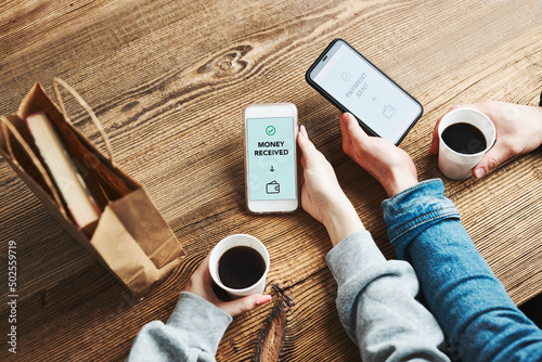 Money transfer. Online banking. People transferring money online using applications for send and receive money on smartphones. Friends making money transfers. Paying for online shopping