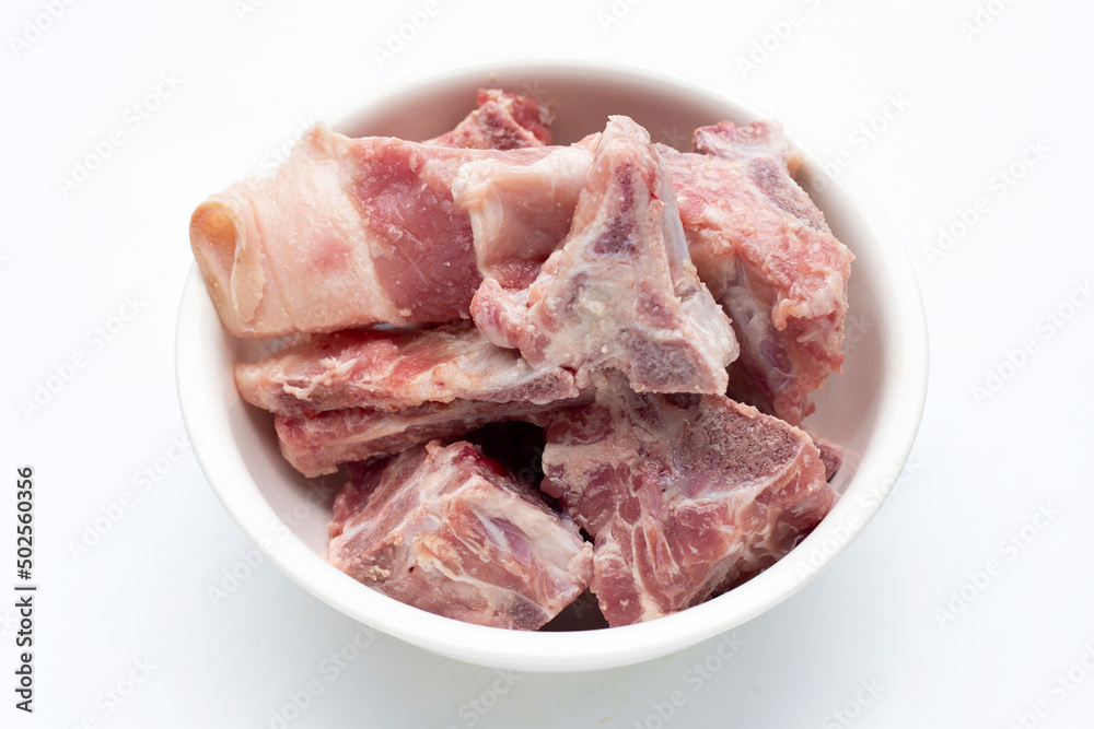 Raw pork bone isolated on white background.