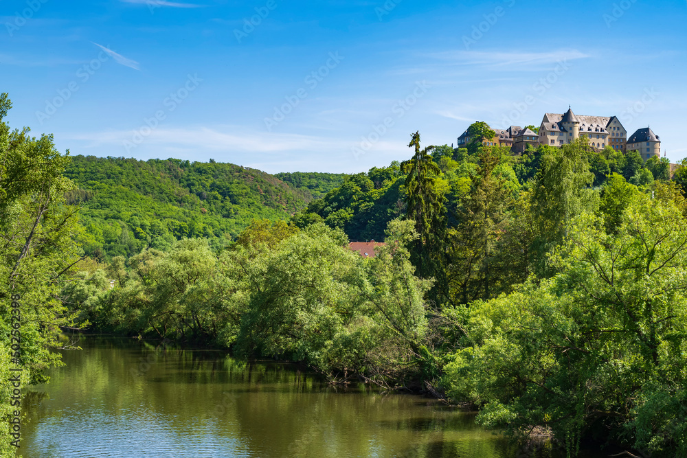 View over the river Nahe with the castle of Ebernburg/Germany in the background