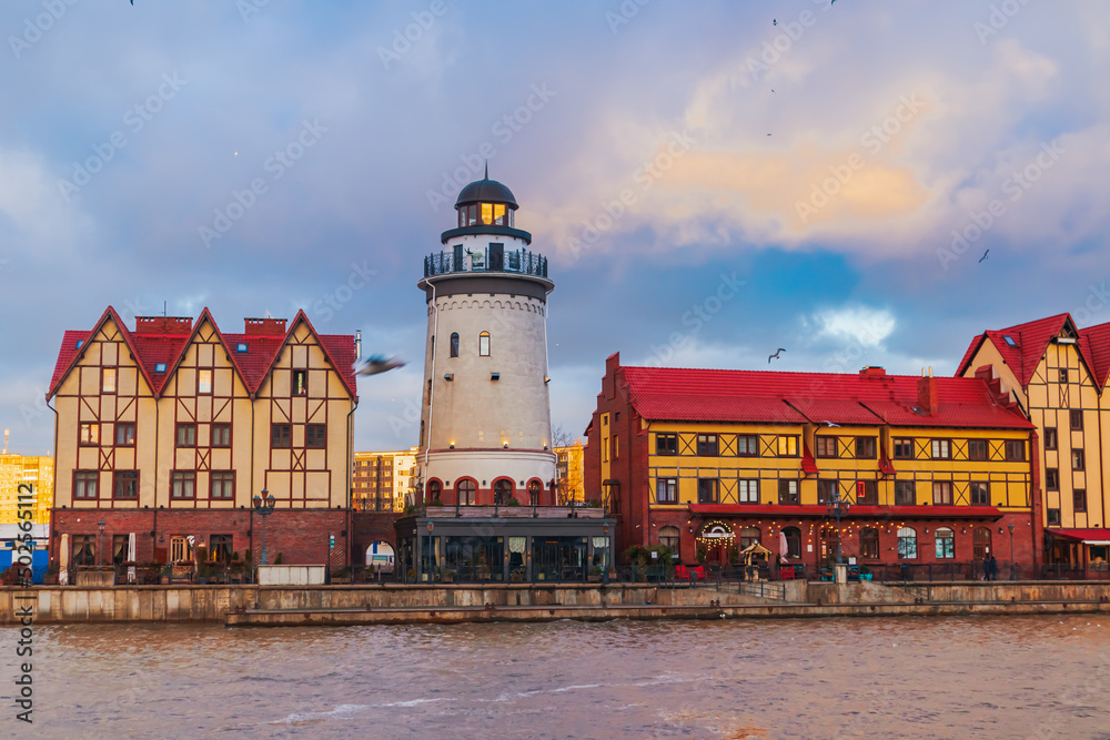 Fishing village in Kaliningrad. Stylization of ancient Europe, lighthouse, ancient houses.