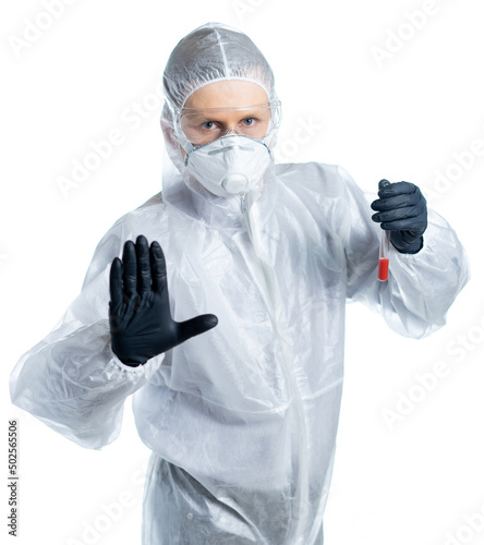 laboratory assistant, doctor, expert holds a medical flask with blood and stops us with a gesture, warns of danger. pandemic, epidemic, virus, coronavirus, flu, orvi. stay at home. isolated photo