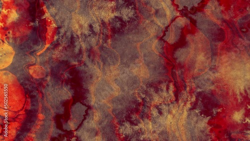 Flowing liquid and texture effect in fire and earth tones.