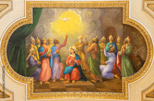 VALENCIA, SPAIN - FEBRUAR 17, 2022: The fresco of Pentecost in the church Iglesia del Santo Angel Custodio from 20.cent. photo