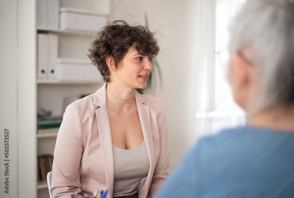 Obraz premium Young female candidate laughing at job interview.