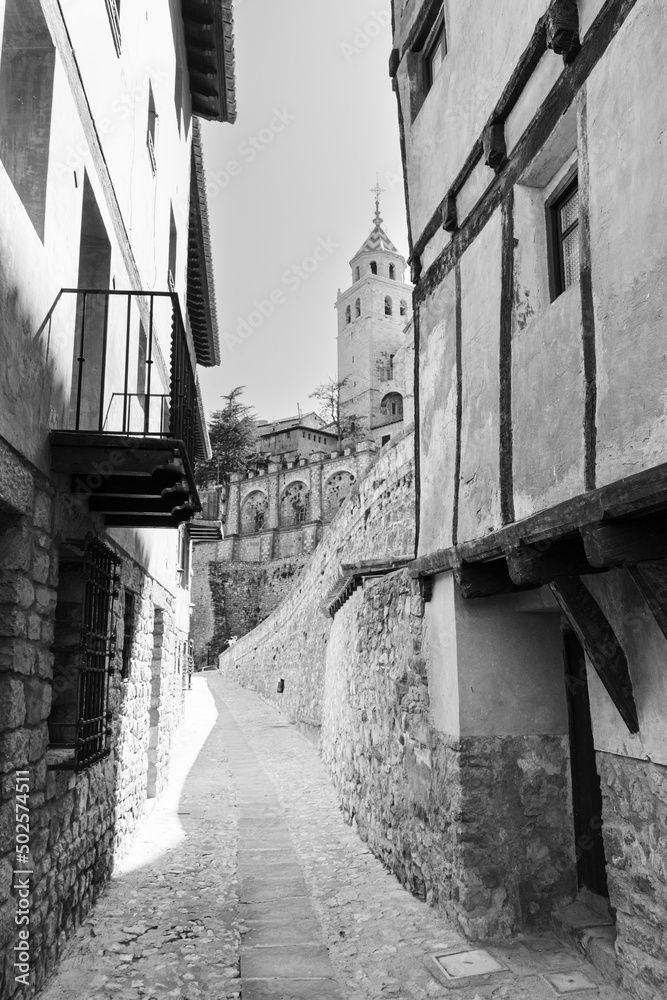 An Albarracin's street. Vertical picture of a traditional street of Albarracin, Teruel, Aragón, Spain. Vertical black and white picture
