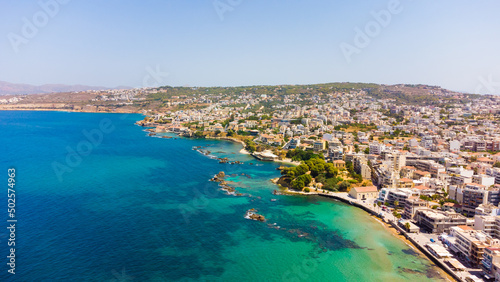 Aerial view of the beautiful city of Chania with it's old harbor and the famous lighthouse, Crete, Greece.