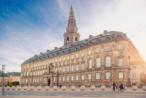 Christiansborg Palace with Christiansborg tower - the seat of the Danish Parliament in the rays of the setting sun. Copenhagen, Denmark photo
