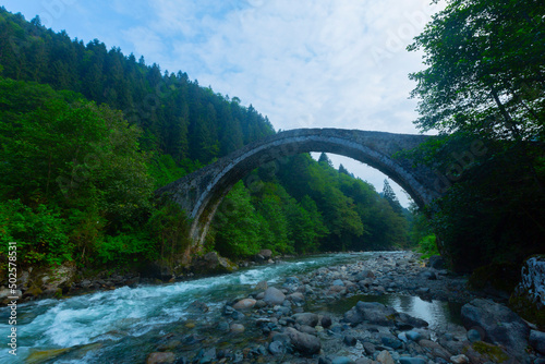 Famous senyuva (cinciva) stone bridge on the storm valley (Firtina vadisi), Rize, Turkey photo