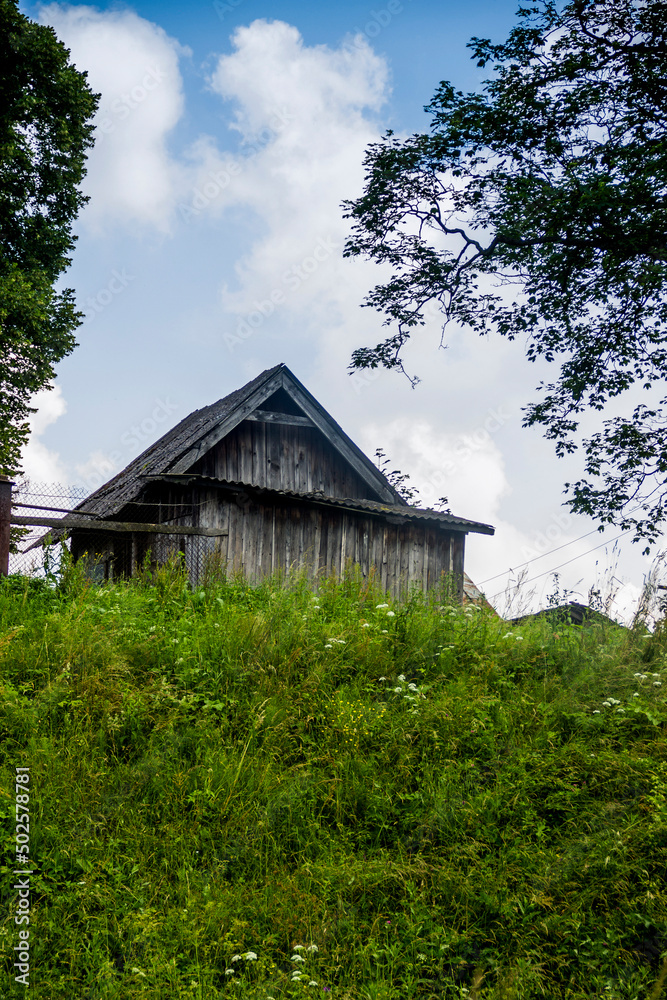 Fototapeta premium small wooden shed in ukrainian village