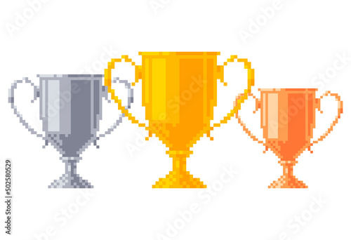 Pixel golden, silver and bronze trophy pack. Cups in 8-bit style. Vector illustration.