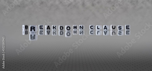 breakdown clause word or concept represented by black and white letter cubes on a grey horizon background stretching to infinity