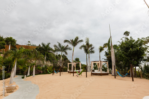 view of nice straw hammock on the tropic beach © Angelov