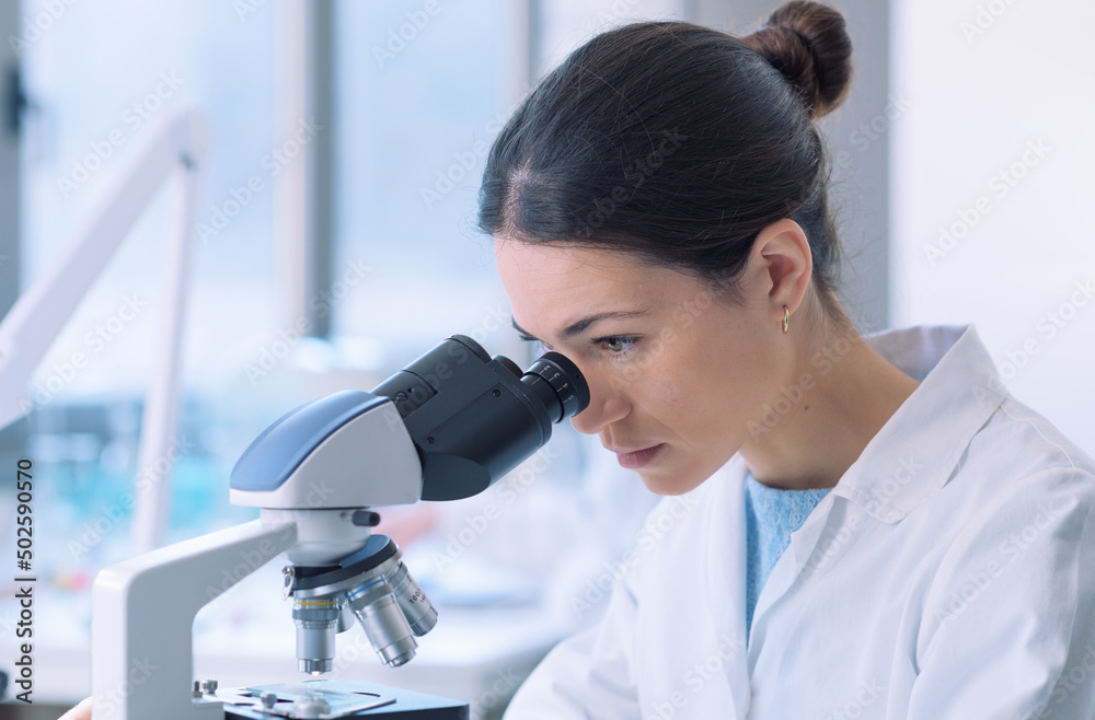 Young researchers working in the clinical laboratory Young researchers working in the clinical laboratory