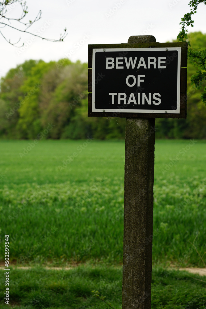 beware of ghost train sign