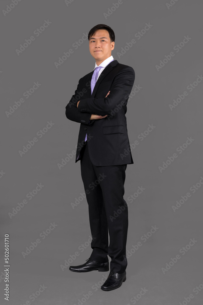 Portrait of attractive businessman Asian standing against on gray background with copy space and clipping path Portrait of attractive businessman Asian standing against on gray background with copy space and clipping path