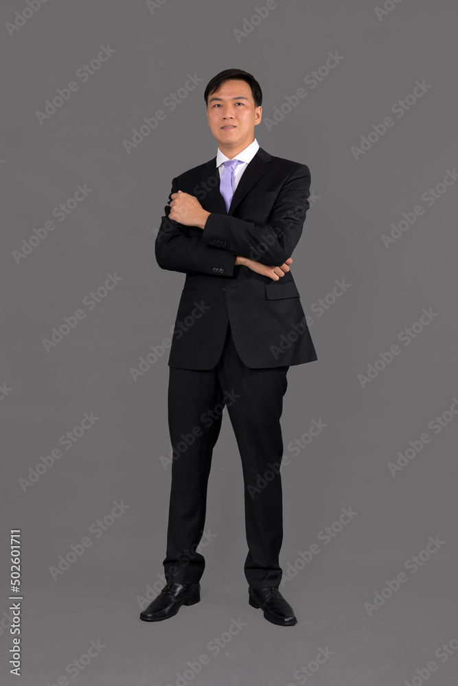 Portrait of attractive businessman Asian standing against on gray background with copy space and clipping path Portrait of attractive businessman Asian standing against on gray background with copy space and clipping path