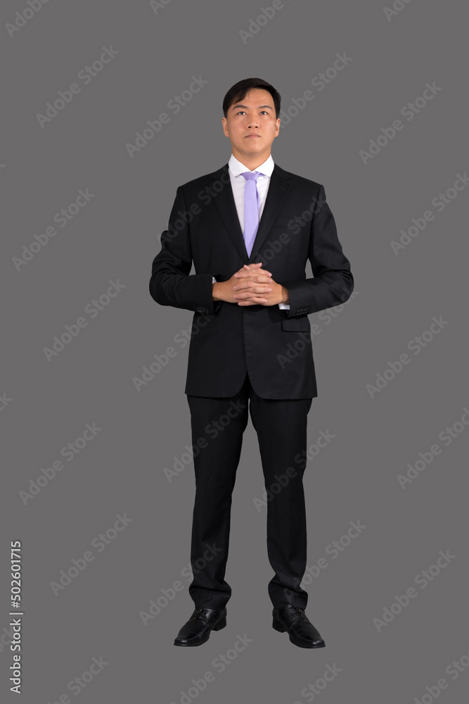 Portrait of attractive businessman Asian standing against on gray background with copy space and clipping path Portrait of attractive businessman Asian standing against on gray background with copy space and clipping path