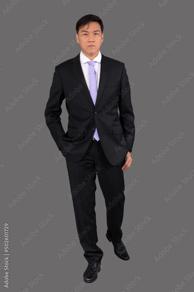 Portrait of attractive businessman Asian standing against on gray background with copy space and clipping path Portrait of attractive businessman Asian standing against on gray background with copy space and clipping path