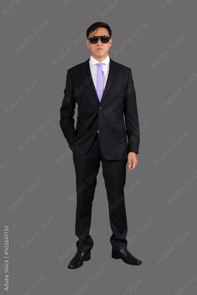Portrait of attractive businessman Asian standing against on gray background with copy space and clipping path Portrait of attractive businessman Asian standing against on gray background with copy space and clipping path