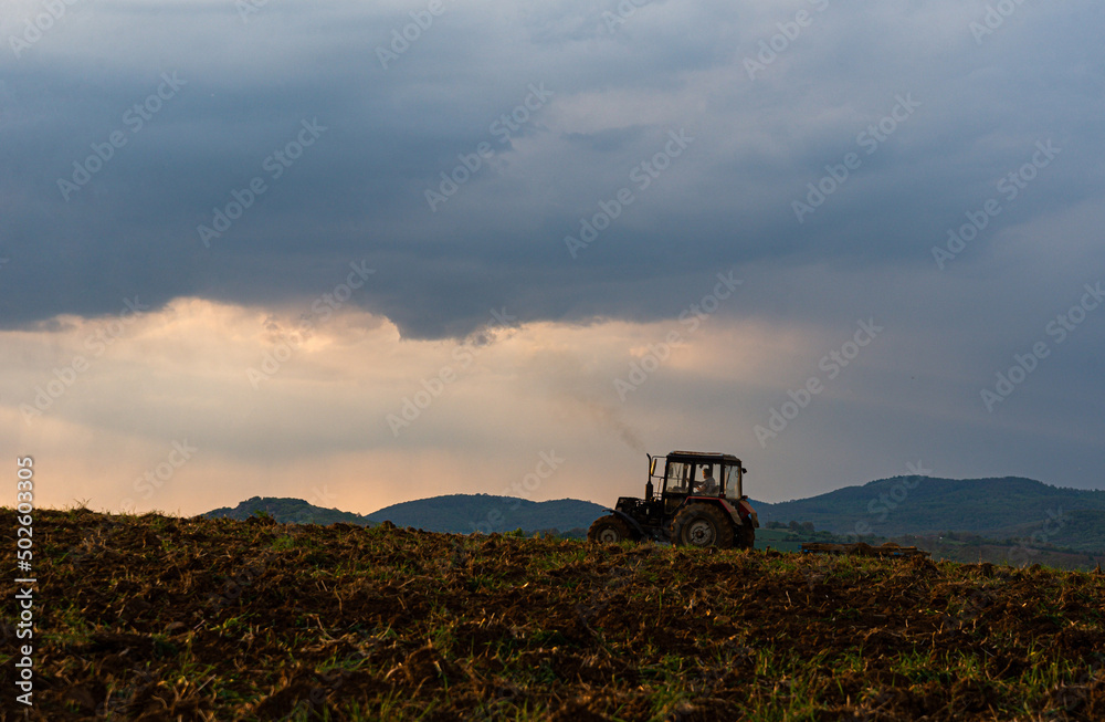 tractor working on field outdoor