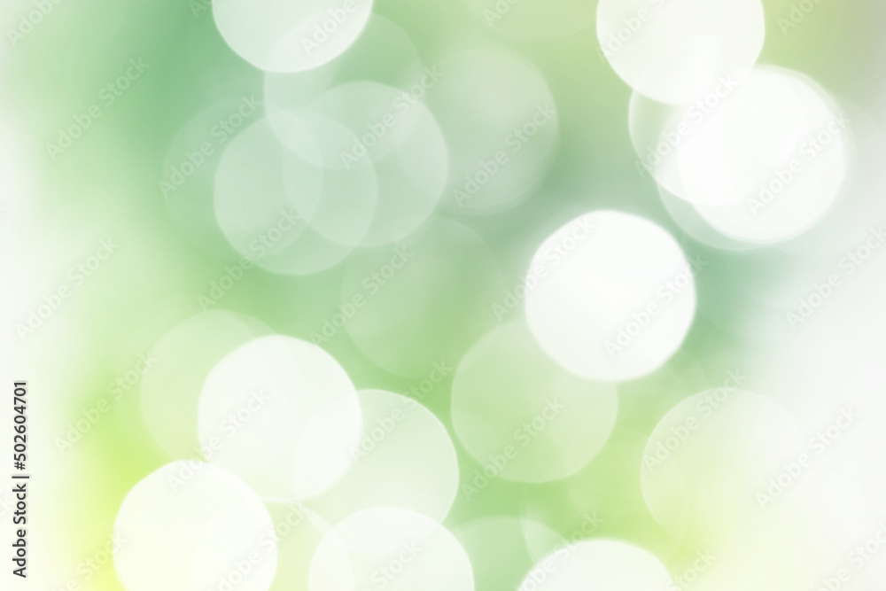 Fototapeta premium Summer green sparkling glitter bokeh background, abstract defocused lights texture