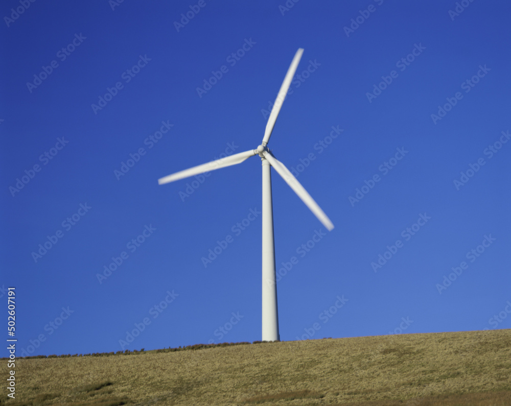 Low angle view of a wind turbine on a hill, Scotland Low angle view of a wind turbine on a hill, Scotland