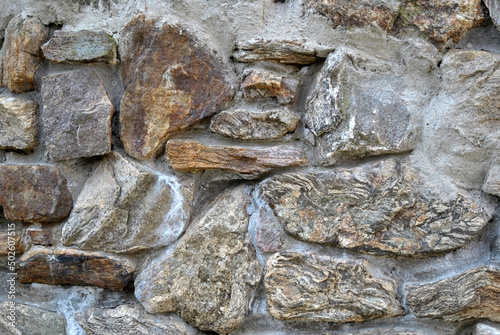 Zdjęcie przedstawiające fragment kamiennego muru