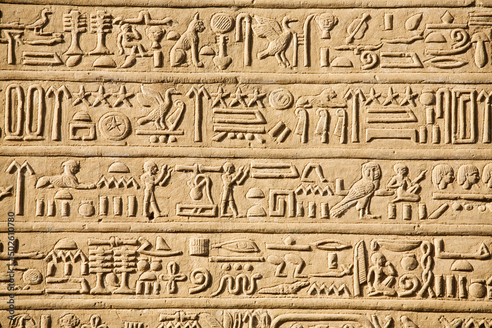 Egypt, Hieroglyphics carved into wall of Temple of Horus and Sobek at ancient ruins of Kom Ombo on Nile River Egypt, Hieroglyphics carved into wall of Temple of Horus and Sobek at ancient ruins of Kom Ombo on Nile River