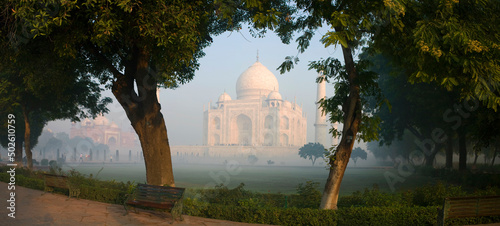 Trees in a park with a mausoleum in the background, Taj Mahal, Agra, Uttar Pradesh, India photo
