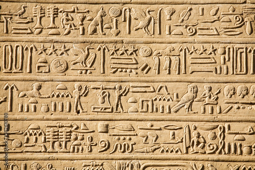 Egypt, Hieroglyphics carved into wall of Temple of Horus and Sobek at ancient ruins of Kom Ombo on Nile River photo